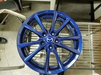 Emilia - OEM Wheel Powdercoated Volk Mag Blue with Custom Painted Center Cap.jpeg